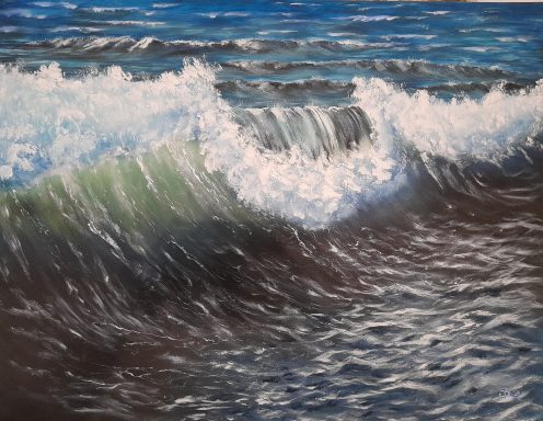 Vagues déferlantes sur une plage, avec des nuances de bleu et de vert.